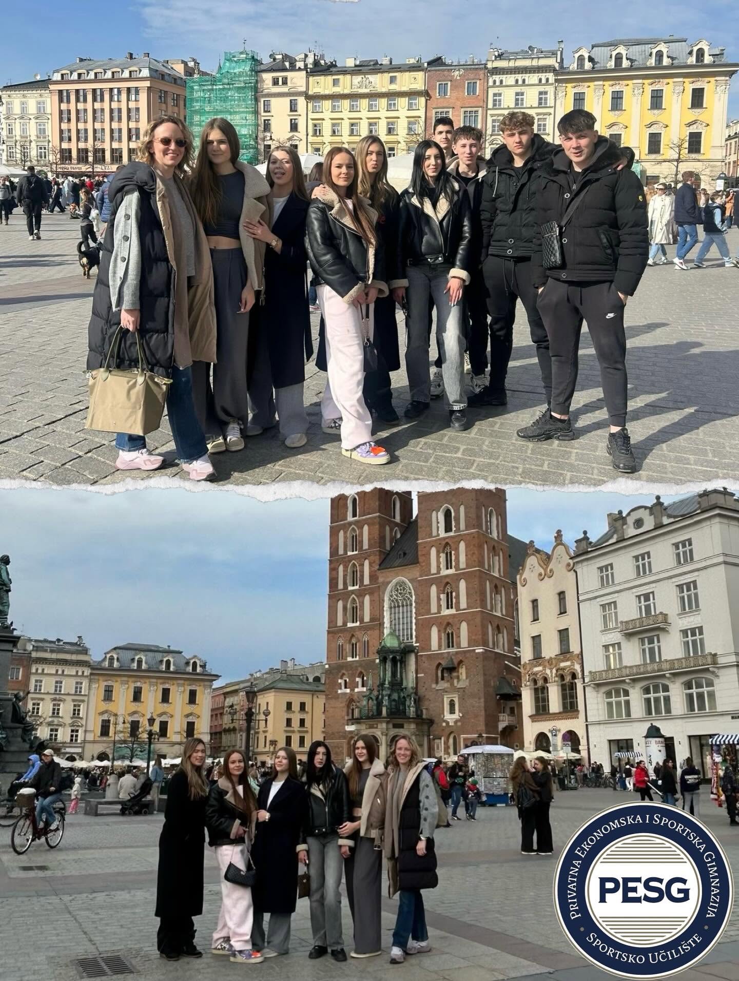 Group of students posing for a photo in a sunny city square with colorful historic buildings behind them.",